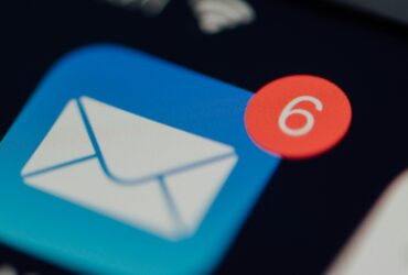 The email app on a mobile device with six notifications