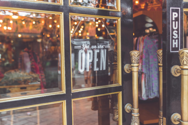 storefront with open sign on door